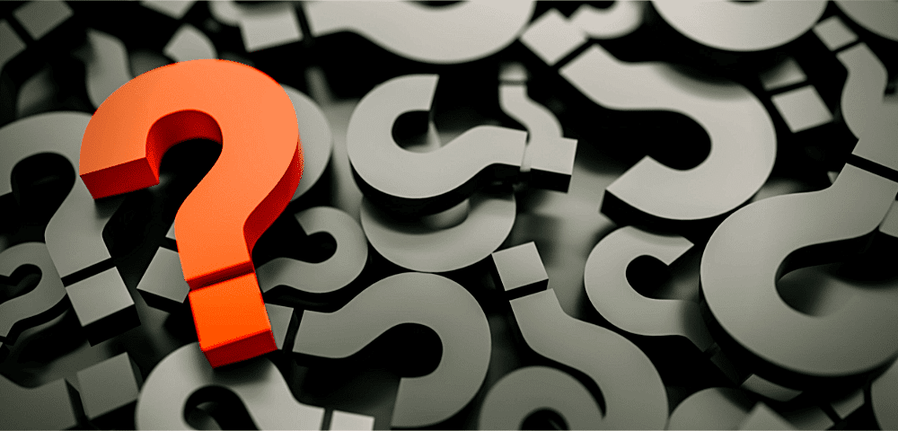 Photo of Questions marks pilled on top of each other